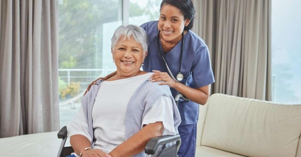 Smiling elderly woman receiving compassionate support from a home health nurse at her Michigan home- illustrating the difference between Home Health Nursing vs Home Care.