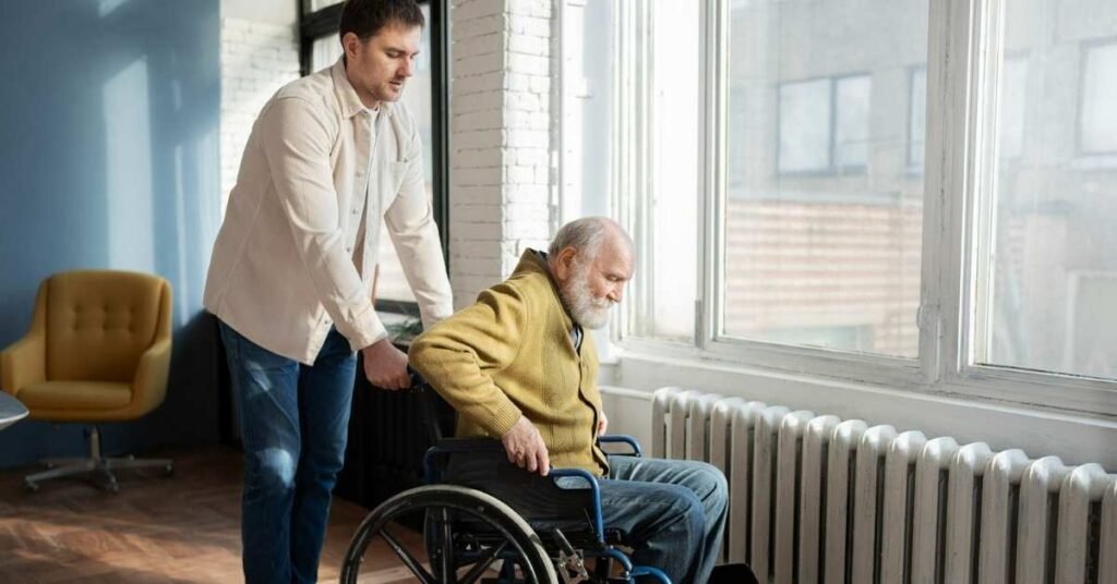 Special needs home care in Michigan providing disability care support as a professional caregiver assists a senior using a wheelchair safely at home.